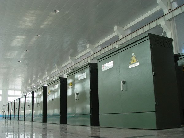Rows of JSHP distribution transformers in the factory